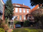 Mölln Altstadt! Eine Einheit sofort frei zur Eigennutzung! Starke 6,5% Rendite-Soll für Investoren! - Gartenansicht