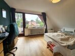 Ruhiges Wohnen, starke Anbindung – Kapitalanlage in gefragter Lage Möllns! - Schlafzimmer Dachgeschoss
