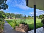 Rückzugsort Dargow am Schaalsee - fernab des Trubels! Komfort, Stil und modernste Technik vereint! - Blick zum Garten